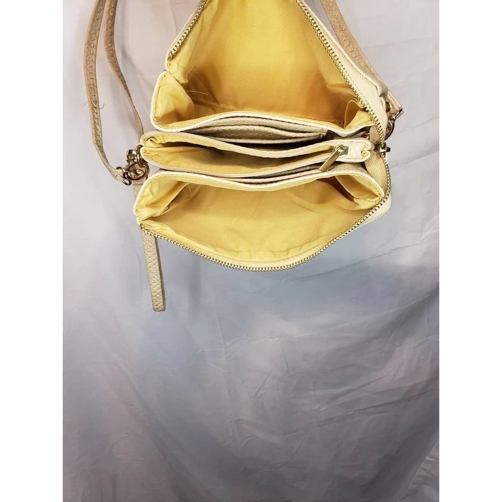 Tan crossbody. Approx 20